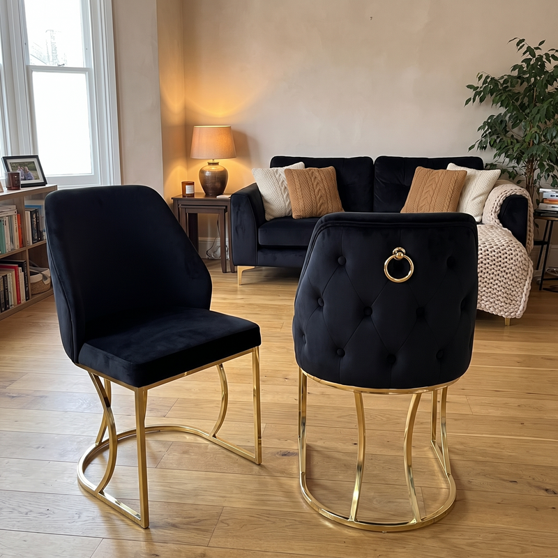 Black velvet dining chair with buttoned back and gold ring pull on a curved gold loop base — Milan, Prague and Capri