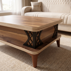 Detail of the black openwork bracket with diamond fretwork joining the table body to its lower plinth